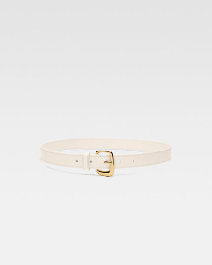 La ceinture Ovalo/“J" buckle Light Ivory belt.